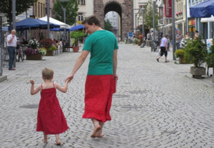 German Dad Supports Crossdressing Son By Wearing Skirts