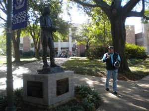 OSA preaches near a Wesley statue at Millsap College minutes before being ejected from the campus.