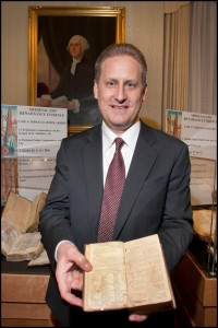 Green with the Aitken Bible, the first printed English Bible in America.