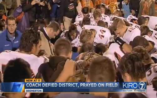 Crowd Joins Christian Coach on Field for Prayer After District Bans Student Participation