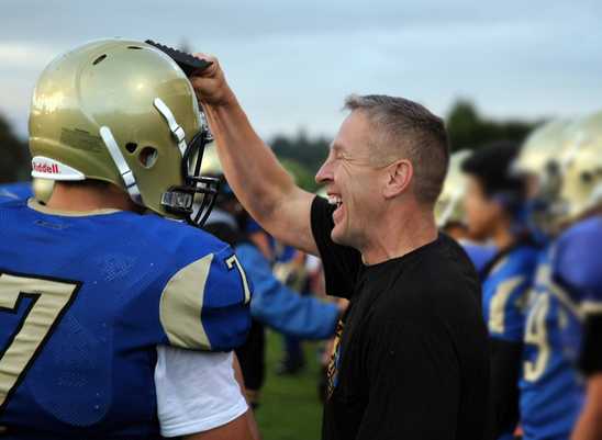 Washington School District Places Football Coach on Leave Until He Stops Praying on Field