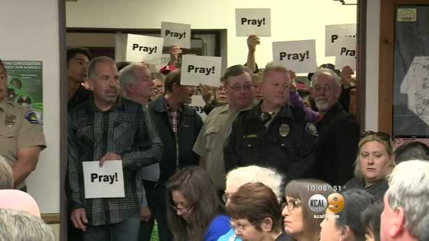 Hundreds Flood School Board Meeting in Support of Appeal of Court Order to End Prayer Practice