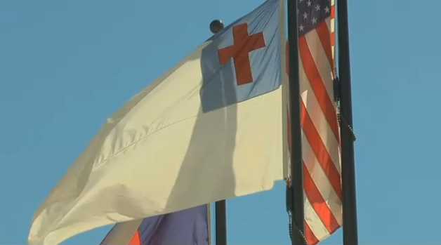 Community Supports Christian Flag Flying Outside Public School Following Atheist Complaint