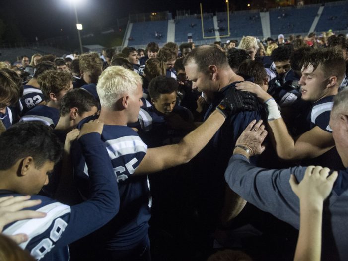 ‘Play, Don’t Pray!’ Atheist Group Lodges Complaint After Coach Photographed Praying With Team