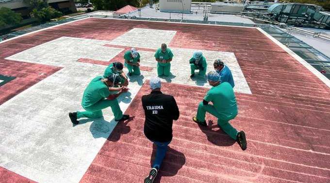 Health Care Workers Join Together on Hospital Helipads to Pray for Staff and Patients Health Care Workers Join Together on Hospital Helipads to Pray for Staff and Patients