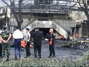 ndonesian President Joko Widodo (in white) at one of the church buildings attacked by terrorists in May 2018. (Press Bureau of the Secretariat of the President of Indonesia)